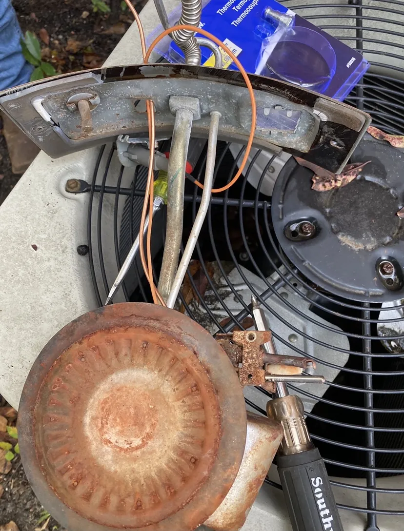 Wiring and copper lines inside an outdoor condenser